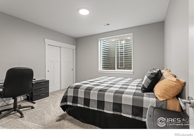 5031 Prairie Lark Ln, Severance, CO 80615 - carpeted bedroom with a closet and a desk