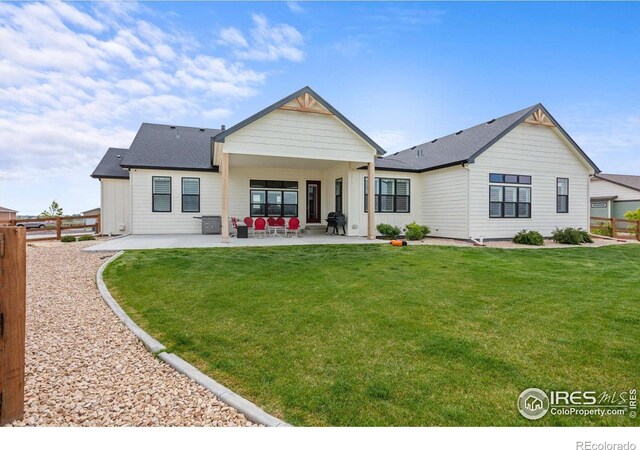 5031 Prairie Lark Ln, Severance, CO 80615 - rear view of property with a patio area