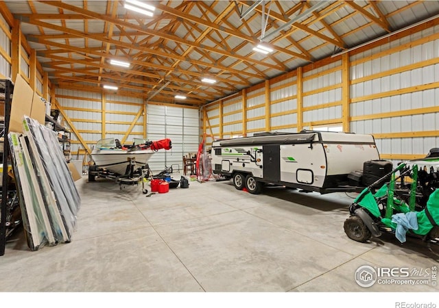 5031 Prairie Lark Ln, Severance, CO 80615 - garage featuring metal wall