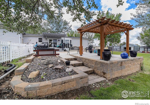 10635 County Road 24, Fort Lupton, CO 80621 - view of patio featuring a pergola