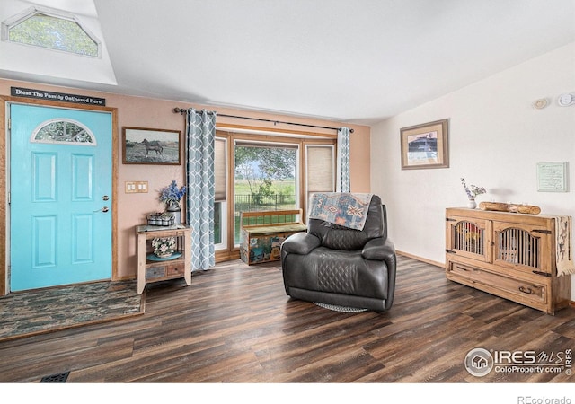 10635 County Road 24, Fort Lupton, CO 80621 - living area with wood finished floors and baseboards