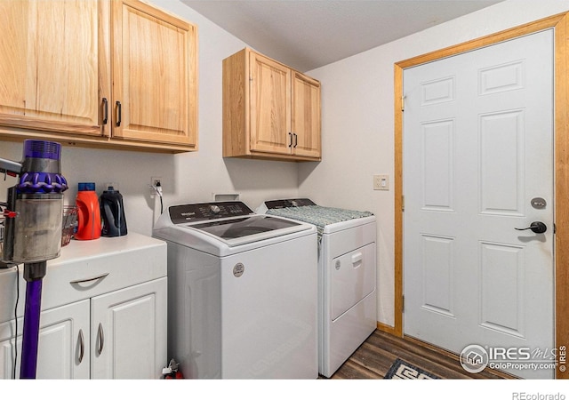10635 County Road 24, Fort Lupton, CO 80621 - laundry area featuring cabinet space, washing machine and clothes dryer, and dark wood finished floors