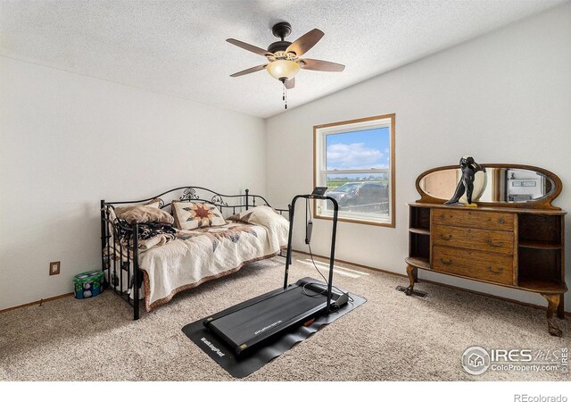 10635 County Road 24, Fort Lupton, CO 80621 - bedroom featuring carpet floors, a textured ceiling, and ceiling fan