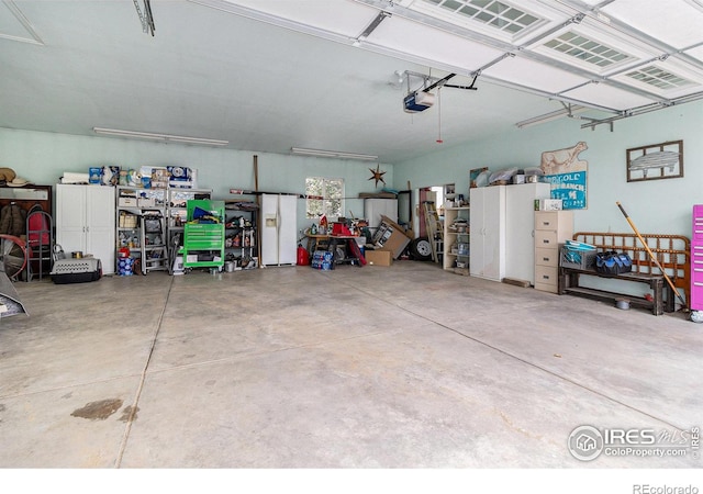 10635 County Road 24, Fort Lupton, CO 80621 - garage with a garage door opener