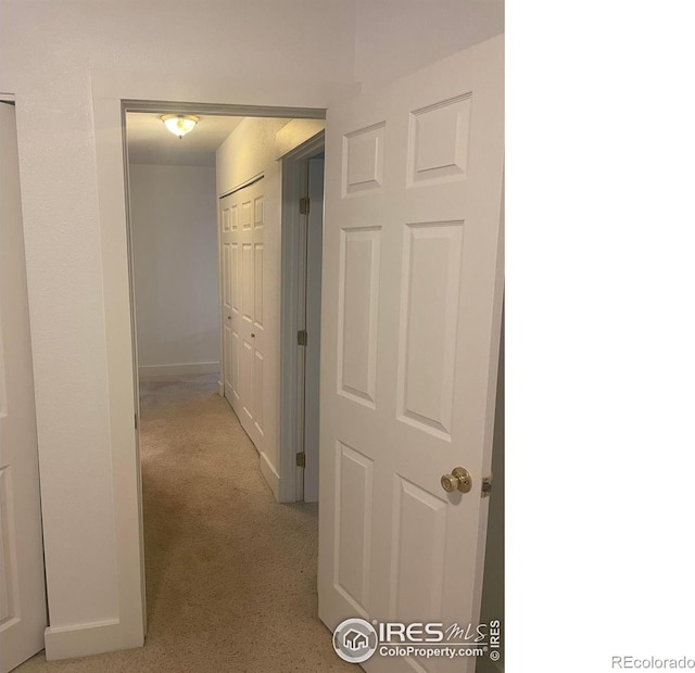 936 Parkview St, Louisville, CO 80027 - corridor featuring light carpet and baseboards