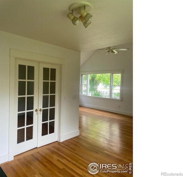 936 Parkview St, Louisville, CO 80027 - empty room with french doors, baseboards, wood finished floors, and ceiling fan