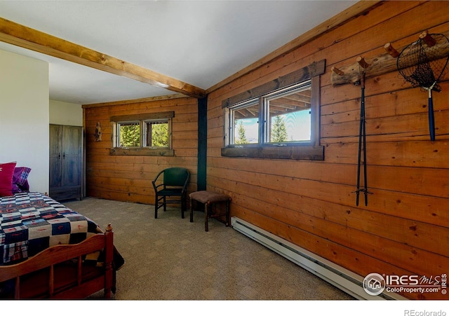 47 County Road 471, Grand Lake, CO 80447 - carpeted bedroom with wooden walls, baseboard heating, and beam ceiling