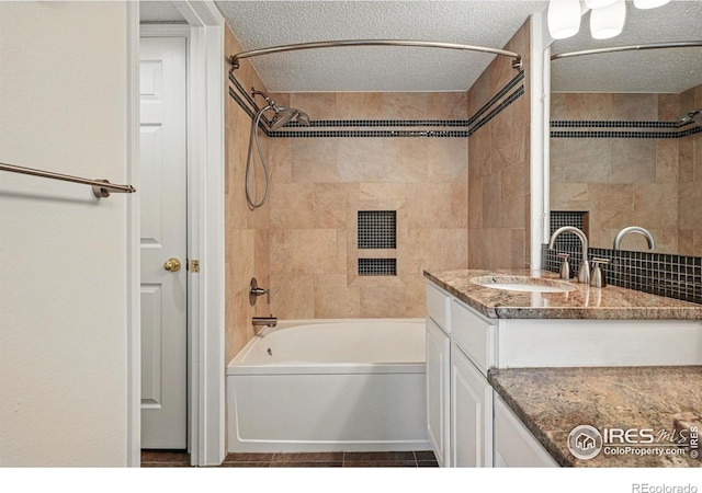 1837 Spaulding Cir, Superior, CO 80027 - full bathroom with  shower combination, a textured ceiling, vanity, and tile patterned flooring