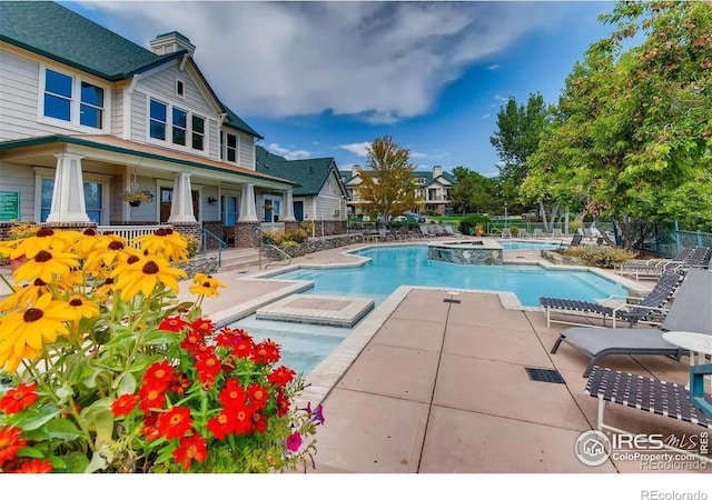1837 Spaulding Cir, Superior, CO 80027 - view of swimming pool featuring a pool with connected hot tub and a patio