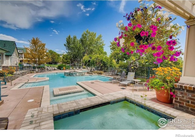 1837 Spaulding Cir, Superior, CO 80027 - community pool with a community hot tub and a patio