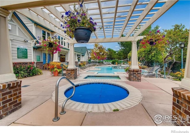 1837 Spaulding Cir, Superior, CO 80027 - outdoor pool featuring a hot tub, a pergola, and a patio area