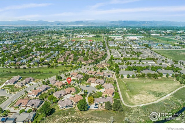 5112 Daylight Ct, Fort Collins, CO 80528 - aerial overview of property's location featuring mountains and nearby suburban area