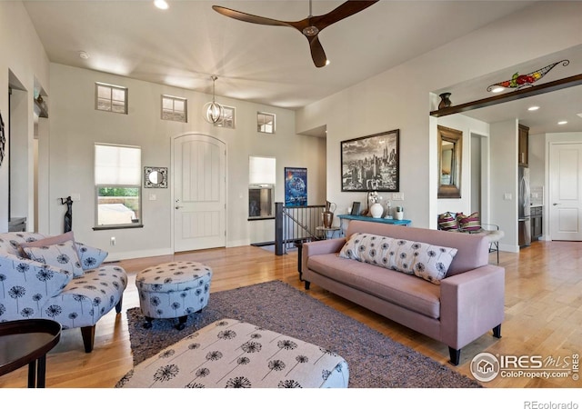 5112 Daylight Ct, Fort Collins, CO 80528 - living area with light wood-style floors, recessed lighting, a ceiling fan, and baseboards
