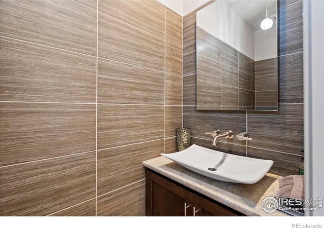 5112 Daylight Ct, Fort Collins, CO 80528 - bathroom with tile walls and vanity