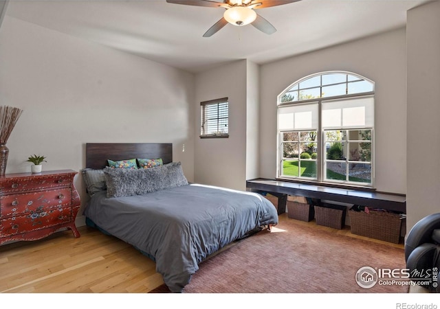 5112 Daylight Ct, Fort Collins, CO 80528 - bedroom with wood finished floors and a ceiling fan