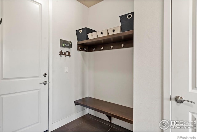 5112 Daylight Ct, Fort Collins, CO 80528 - mudroom with dark tile patterned floors