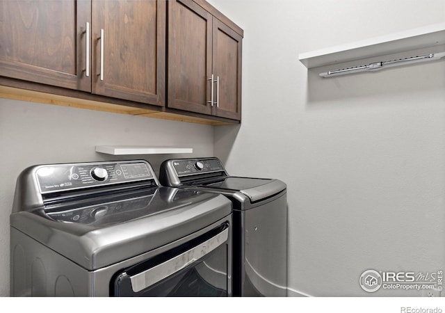 5112 Daylight Ct, Fort Collins, CO 80528 - washroom with cabinet space and washer and dryer