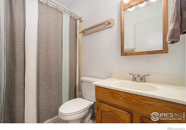 4117 Shannon Dr, Laporte, CO 80535 - bathroom with vanity, toilet, and curtained shower