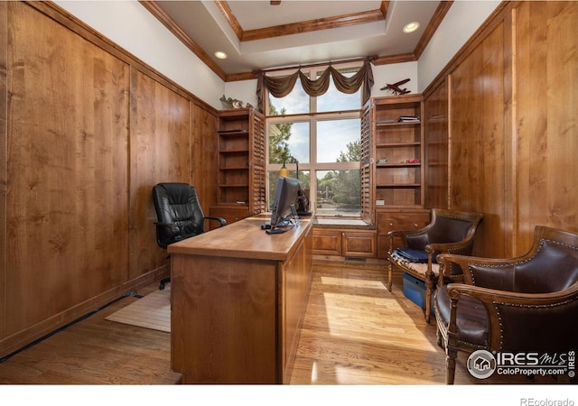 13 Blue Heron Dr, Thornton, CO 80241 - home office with light wood-style floors, ornamental molding, a raised ceiling, wooden walls, and recessed lighting