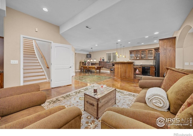13 Blue Heron Dr, Thornton, CO 80241 - living room featuring recessed lighting, bar, and stairway