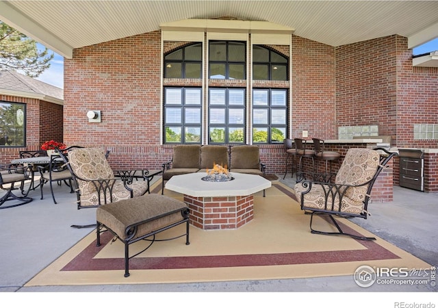 13 Blue Heron Dr, Thornton, CO 80241 - view of patio / terrace with an outdoor fire pit and outdoor dining area