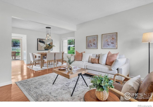 790 W Moorhead Cir # A, Boulder, CO 80305 - living area featuring light wood-style floors and baseboards