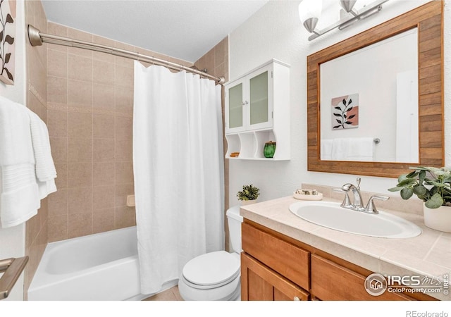 790 W Moorhead Cir # A, Boulder, CO 80305 - bathroom with vanity, shower / bath combo with shower curtain, and toilet