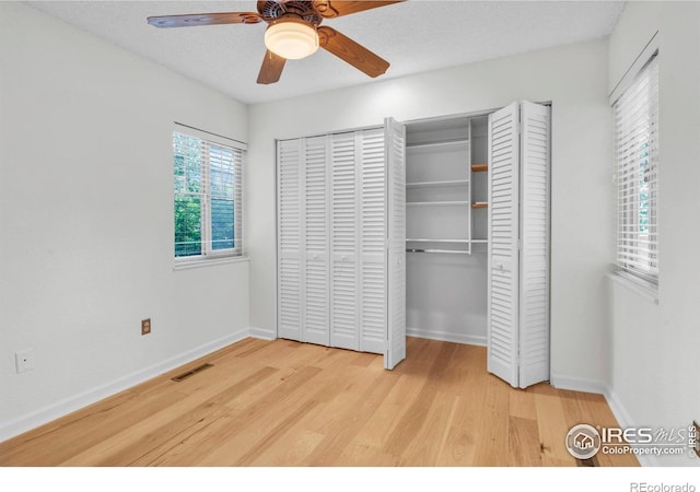 790 W Moorhead Cir # A, Boulder, CO 80305 - unfurnished bedroom with wood finished floors, baseboards, and ceiling fan
