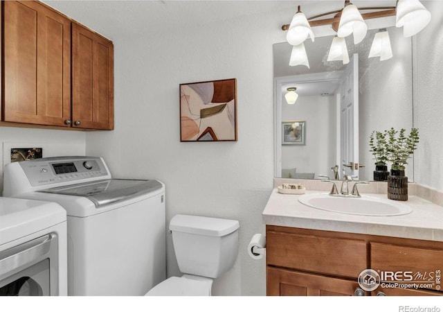 790 W Moorhead Cir # A, Boulder, CO 80305 - bathroom with washer and clothes dryer, toilet, and vanity