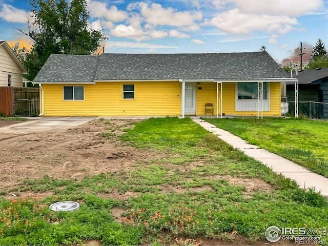 522 K Ave, Limon, CO 80828 - bungalow-style home featuring roof with shingles and a porch