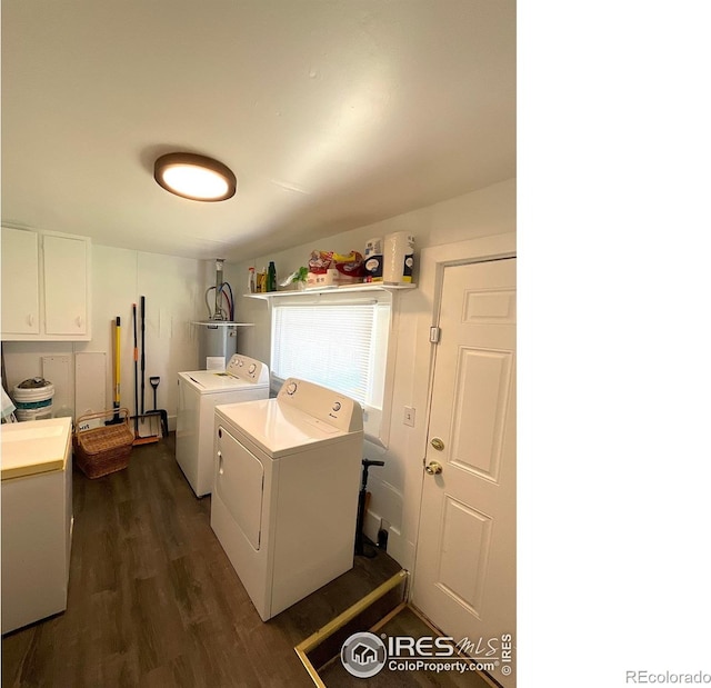 522 K Ave, Limon, CO 80828 - laundry room featuring washer and dryer, cabinet space, dark wood-style flooring, and water heater