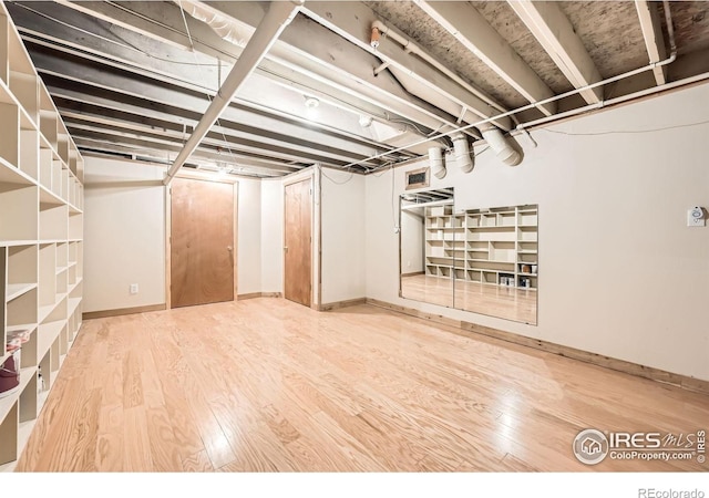 613 Ranch Rd, Ward, CO 80481 - finished basement with wood finished floors
