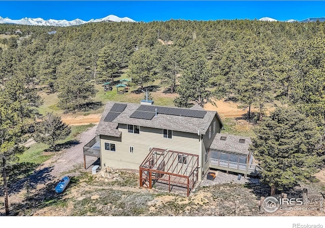 613 Ranch Rd, Ward, CO 80481 - view from above of property featuring a mountainous background and a heavily wooded area