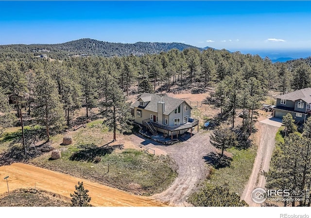613 Ranch Rd, Ward, CO 80481 - view from above of property with a heavily wooded area and mountains
