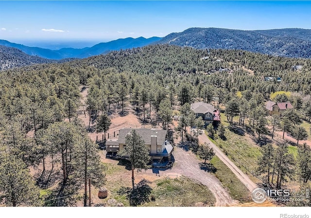 613 Ranch Rd, Ward, CO 80481 - aerial view of property and surrounding area with a forest and mountains