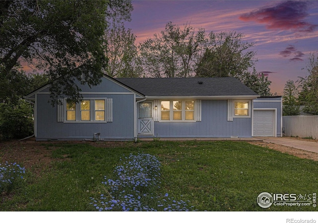 2116 16th St, Greeley, CO 80631 - view of front of property with driveway and a garage