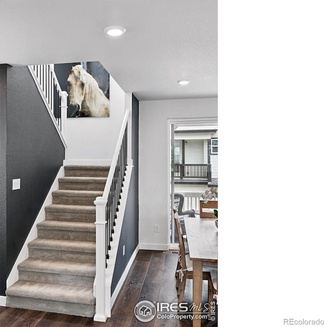 926 Hearteye Trl, Lafayette, CO 80026 - stairs featuring wood finished floors, baseboards, and recessed lighting