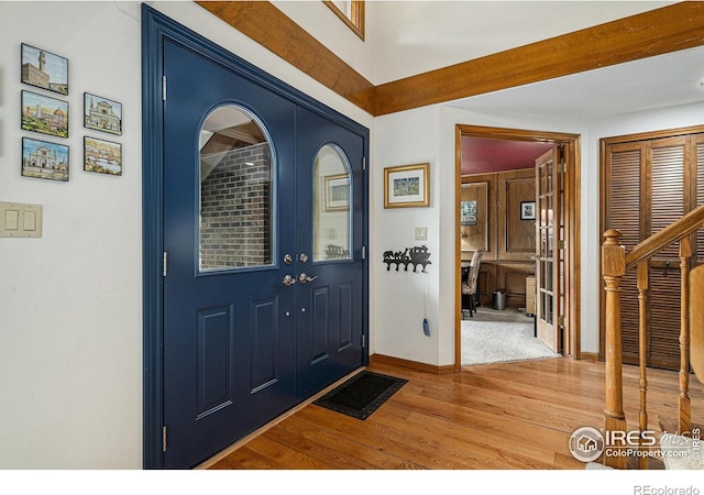 3441 W Dartmouth Ave, Denver, CO 80236 - entryway with light wood-style floors and baseboards
