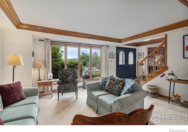 3441 W Dartmouth Ave, Denver, CO 80236 - living room with ornamental molding, light colored carpet, stairway, a tray ceiling, and baseboards