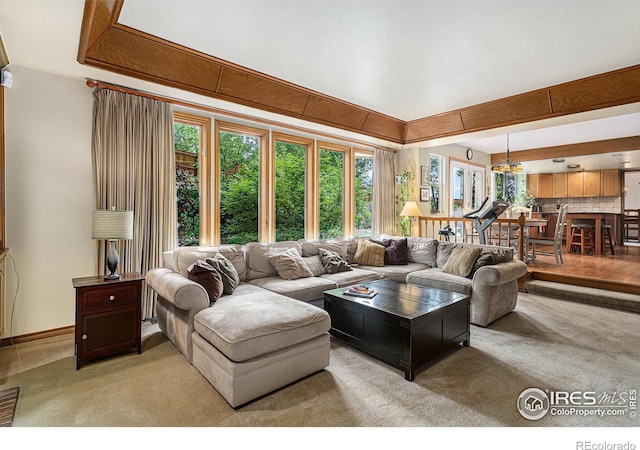 3441 W Dartmouth Ave, Denver, CO 80236 - living area with light colored carpet and baseboards