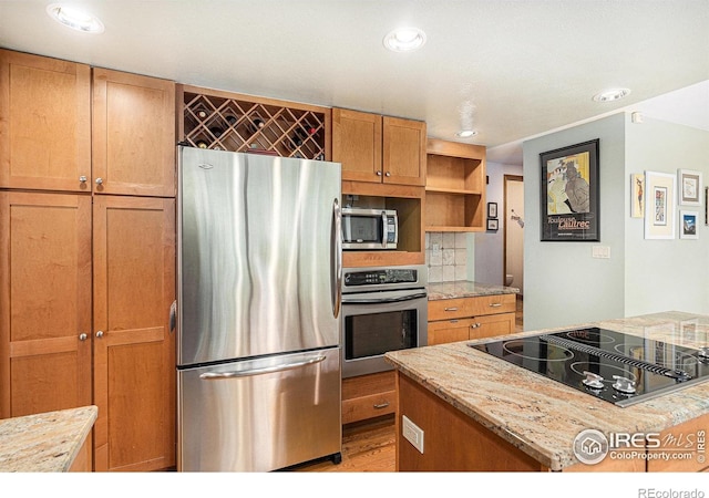 3441 W Dartmouth Ave, Denver, CO 80236 - kitchen with stainless steel appliances, open shelves, recessed lighting, light stone counters, and backsplash