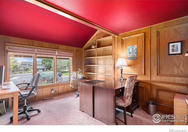 3441 W Dartmouth Ave, Denver, CO 80236 - office featuring lofted ceiling, wood walls, carpet flooring, and built in features