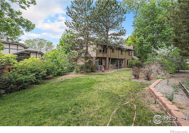 3441 W Dartmouth Ave, Denver, CO 80236 - view of grassy yard