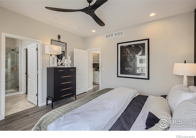945 Abbott Ln Unit 5, Fort Collins, CO 80524 - bedroom with wood finished floors, ensuite bath, recessed lighting, and ceiling fan