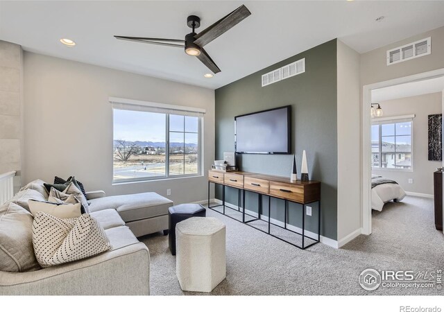 945 Abbott Ln Unit 5, Fort Collins, CO 80524 - carpeted living area featuring ceiling fan, healthy amount of natural light, baseboards, and recessed lighting