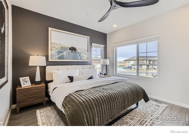 945 Abbott Ln Unit 5, Fort Collins, CO 80524 - bedroom featuring baseboards, wood finished floors, and ceiling fan