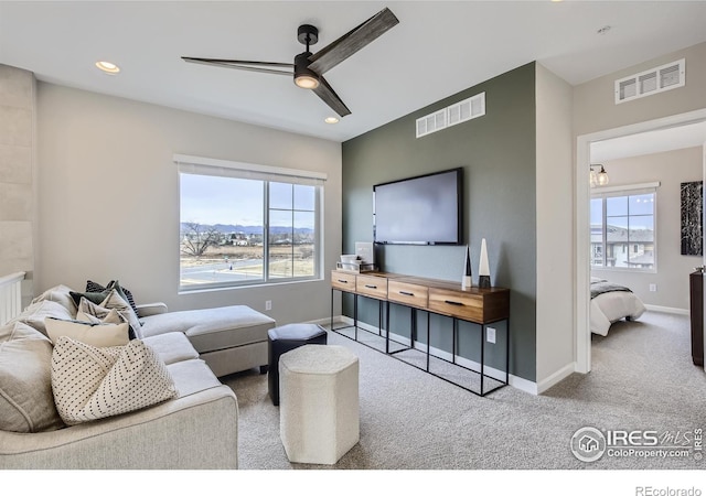 945 Abbott Ln Unit 5, Fort Collins, CO 80524 - carpeted living area featuring ceiling fan, healthy amount of natural light, baseboards, and recessed lighting