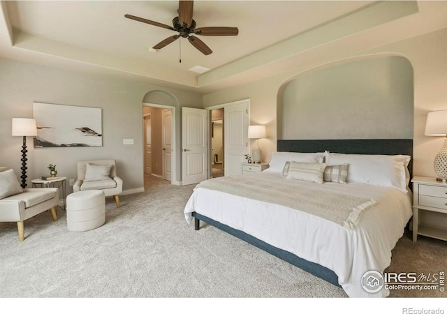 2315 Haymeadow Way, Fort Collins, CO 80525 - bedroom featuring arched walkways, carpet, baseboards, and ceiling fan