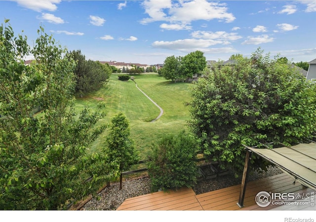 2315 Haymeadow Way, Fort Collins, CO 80525 - view of green lawn featuring a wooden deck