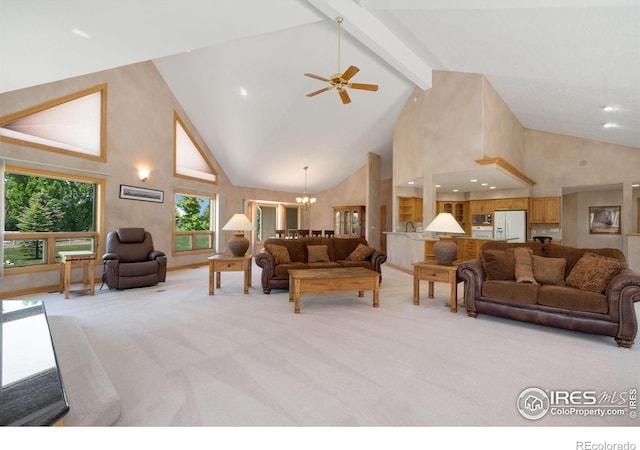 6239 Ashcroft Rd, Greeley, CO 80634 - living area with high vaulted ceiling, light carpet, a chandelier, ceiling fan, and beamed ceiling